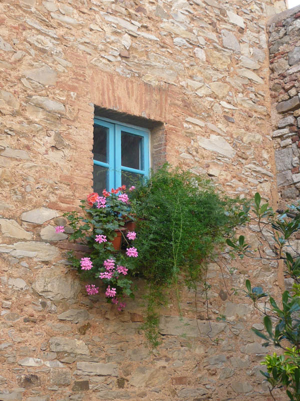A colourful window in a Tuscan Village